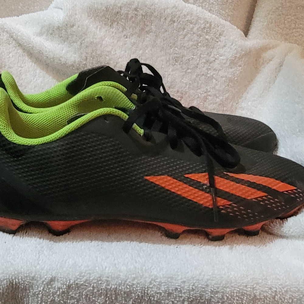 Adidas Black and Orange Cleats with Green Accents